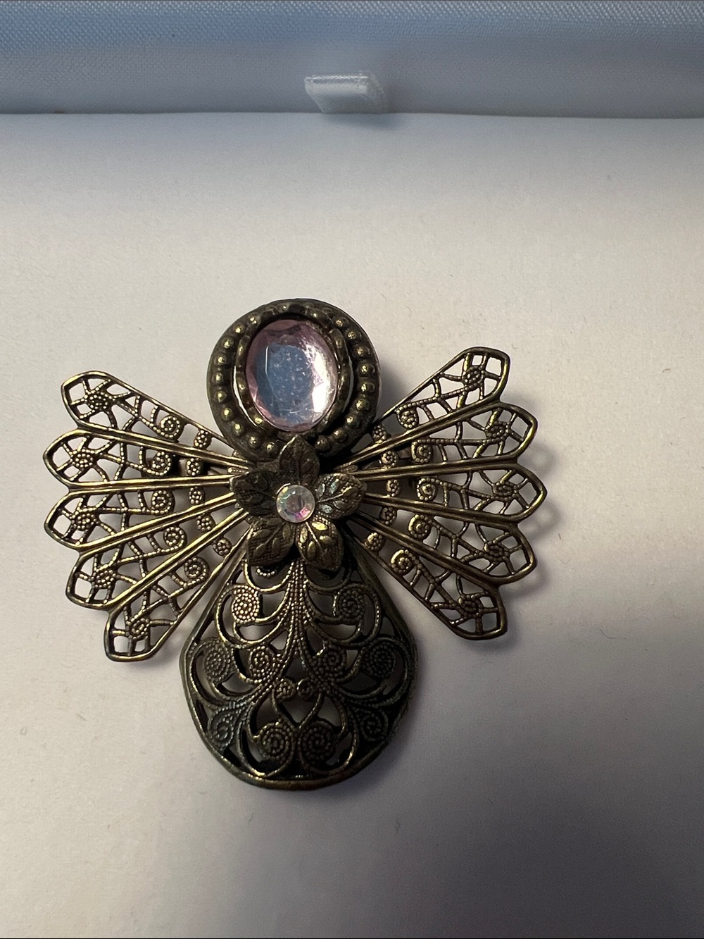 Kenneth Cole Filigree Angel Brooch with clear Glass Stone